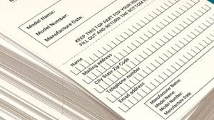 stack of cards for product registration program for baby carriers